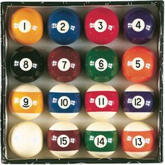 eight ball pool set with numbers in an open box