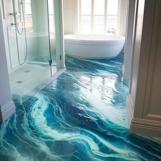 a bathroom with blue and green flooring next to a bathtub in the corner