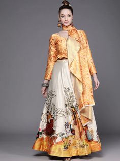 Add a pop of color to your wardrobe with this vibrant yellow digital print croptop lehenga choli. The A-line satin lehenga features a fun and playful print while the croptop choli is made of luxurious silk with a complementary print. Complete the look with the included unstitched blouse. Perfect for weddings and festivals when you want to make a statement! #yellowlehenga #yellowlehengas #yellowlehengacholi #yellowlehengadress #yellowlehengadesigns #yellowlehengadesign #yellowcolorlehenga #designeryellowlehenga Satin Lehenga Choli, Satin Silk, Blouse Fabric, Clothing Rack, Raw Silk