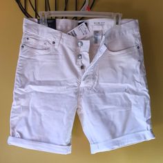 Brand New White Cuffed Shorts, 3 Buttons Instead Of Zipper, Stretch Denim, Slim Fit. Casual Cotton Bermuda Shorts With Rolled Hem, Casual Rolled Hem Bermuda Shorts For Spring, Casual Cotton Jean Shorts With Rolled Hem, Relaxed Fit Jeans With Rolled Hem For Summer, Summer Relaxed Fit Jeans With Rolled Hem, Casual Summer Jeans With Rolled Hem, White Fitted Bermuda Shorts Casual, Casual Rolled Hem Jeans For Summer, Casual Rolled Hem Summer Jeans