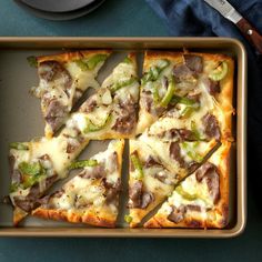 several slices of pizza are on a pan