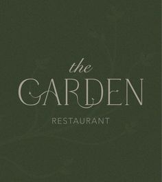 the garden restaurant logo on a dark green background