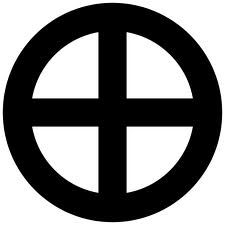 a black and white photo of a cross in a circle