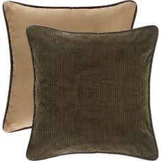 two green velvet pillows with brown piping on the front and back, one is made from