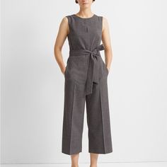 Club Monaco Plaid Jumpsuit Slightly Tapered Leg Concealed Front Zip With Double Hook-And-Bar Closure And Interior Button; Slant Pockets; Center Crease At Front And Back Legs; Five Fabric-Covered Buttons At Outer Ankles; Welt Pockets At The Back Size: 4 Color: Gray & Black 65% Polyester, 33% Viscose, 2% Elastane Lining: 100% Polyester Underarm To Underarm 18” Inseam 23” Waist 28” New With Tags Retail $289 Tailored Sleeveless Spring Pantsuit, Tailored Sleeveless Summer Pantsuit, Tailored Sleeveless Pantsuit For Summer, Chic Tailored Sleeveless Pantsuit, Sleeveless Fitted Pantsuit For Business Casual, Fitted Sleeveless Pantsuit For Business Casual, Sleeveless Fitted Jumpsuits And Rompers For Work, Fitted Sleeveless Jumpsuits For Workwear, Fitted Sleeveless Jumpsuits And Rompers For Work