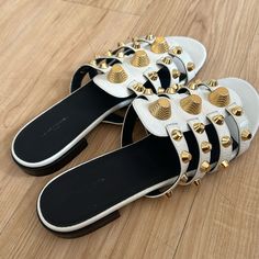 Balenciaga Gold Sandal. In Beige . New . Never Used . Size 38 Designer Closed Toe Summer Mules, Designer Slides With Flat Heel For Summer, Designer Flat Slides For Summer, Designer Summer Flat Slides, Summer Designer Flat Slides, Designer Round Toe Mules For Beach, Designer White Mules For Summer, White Designer Mules For Summer, Designer Flat Mules