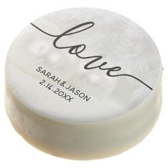 personalized soap bar with white frosting and black ink on it's lid