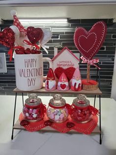 valentine's day candy bar with heart shaped candies and hot chocolates on display