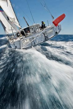 a sailboat is sailing in the open water