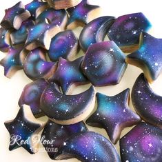 purple and blue cookies with stars on them