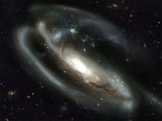 two spiral galaxy like objects in the sky