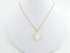 The chain is made of gold-plated stainless steel, it is approx. 1mm thick. The pendant (diamond) is approx. 1.7cm long and approx. 1.2cm wide. The setting is made of gold-plated brass and has a faceted opal white glass stone in the middle. The chain is available in the following lengths: 40cm, 42cm, 45cm,50cm. Please choose your desired length. Since the chain is available in different lengths, you can also make layered chains with it. The chain is delivered in a pretty jewelry box. If desired, I can also add an extension chain to it. In my shop you can find the earrings as well as other stainless steel chains. If you have any other wishes, please contact me. **Used material** Gold-plated diamond frame, gold-plated stainless steel chain, opal white glass stone ** Size / mass / weight ** se White Diamond-shaped Necklace Gift, White Diamond-shaped Necklace As Gift, White Diamond-shaped Necklace For Gift, White Diamond-shaped Jewelry Gift, Chain Necklace Gold, Steel Gifts, Pendant Diamond, Layered Chains, Opal White