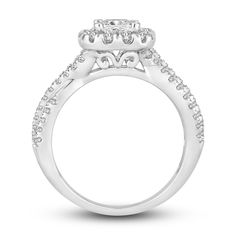 a white gold engagement ring set with diamonds