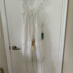 Nwt Soft Delicate Cotton White Flutter Sleeve, Lace Up Front, With Detailed Bead & Feather & Shell Long Ties, Tiered Dress Is Feminine & Stylishly Boho Chic, Super Flattering, Size Small Resort Wear Dresses, Tiered Maxi Dress, Tiered Dress, Resort Wear, Flutter Sleeve, Boho Chic, Lace Up, Maxi Dress, Womens Dresses