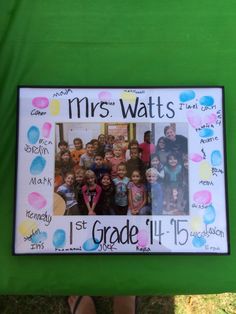 a photo frame with the words, mrs wattts 1st grade 11 - 15 on it