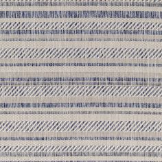 a blue and white striped fabric textured with small, diagonal stripes in varying sizes