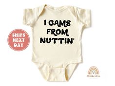 This hilarious and adorable "I Came From Nuttin'" baby shirt is perfect for adding some humor to your little one's wardrobe. Crafted with soft, high-quality fabric, this tee is not only comfortable but also makes a unique and funny gift for new parents. Ideal for baby showers, birthdays, or just because, this shirt will surely be a hit. Available in various sizes and colors, it's a playful way to dress up your baby with a touch of humor. Handmade 100% cotton items How to order: Please select size & style from the drop down menu, select quantity If there is personalization box available(for certain listings) Add your personalization Add to cart If you are ordering multiple shirts with different size & style Add them to the cart separately Then proceed to checkout If in rush, please select p Funny Short Sleeve Onesie With Letter Print, Funny Onesie With Letter Print For Playtime, Funny Short Sleeve Onesie With Name Print, Funny Unisex Onesie With Letter Print, Funny Text Onesie, Funny Text Cotton Onesie For Birthday, Cotton Onesie With Funny Text For Birthday, Birthday Onesie With Funny Text In Cotton, Birthday Cotton Onesie With Funny Text