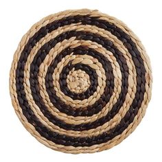 a brown and white round rug on a white background