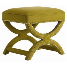 a small stool with studded trim around the legs and foot rests on an isolated white background