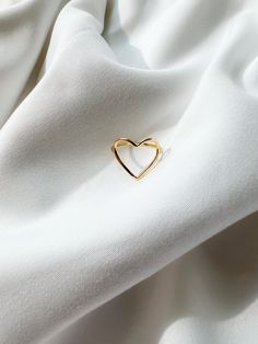 Heart shaped minimal ring. Carry your love with you at all times! Note: Ring is made for size 5.5, but can be resized for free. If you are not the same size as specified and would like to purchase, please purchase and we will reach out to confirm size. Resizing takes 3-4 weeks. Made in 18k Solid Gold. Dimensions: Heart height is 1cm tall, while width is 1.5cm. Minimalist Heart Cut Ring For Everyday, Minimalist Everyday Heart Cut Rings, Minimalist Open Heart Ring For Gift, Minimalist Open Heart Ring Gift, Minimalist Open Heart Midi Rings For Anniversary, Minimalist Rings For Valentine's Day, Modern Heart-shaped Ring For Everyday Wear, Modern Everyday Heart Ring, Minimalist Open Heart Ring