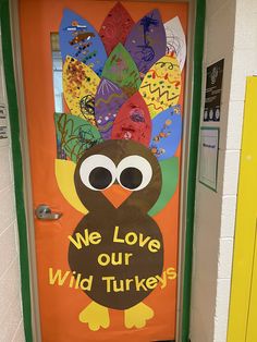 a door decorated with an image of a turkey and the words we love our wild turkeys