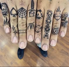 two hands with different tattoos on them