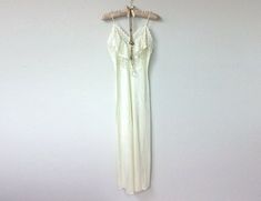 FREE U.S. SHIPPING!! Beautiful and elegant vintage Gilead brand, romantic and feminine lace,  nylon, and satin cream, off white maxi dress, slip dress, with sheer white lace ruffle panel front and thin tubular satin spaghetti straps. Gorgeous feminine design.  Has a classic, ladylike, boudoir ... Ivory Slip Dress, Off White Maxi Dress, Dress Slip, Lace Slip Dress, Lace Slip, Dress Gown, White Maxi, Feminine Design, Lace Ruffle