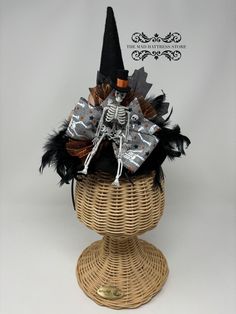 Crowd Favorite! This black felt witch hat has chandelle feather trim, completely around, tulle, adorable Skull ribbon bow and a jaunty Skeleton wearing his best top hat!!  The headband is removable allowing for personal preference in positioning on the head. Fascinators are typically worn off center on the right or left side of the head. Allows you to sport some "Hattitude"! **Check out our fun collection of Halloween Earrings for a coordinated look Felt Witch, Felt Witch Hat, Fascinator Headband, Feather Trim, Halloween Earrings, Costume Hats, Black Felt, Ribbon Bow, Witch Hat