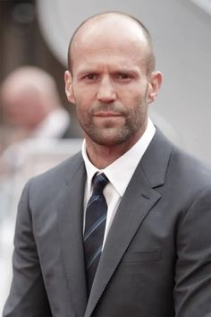 To get Jason Statham’s style bald men look, you can shave your head or try a short stubble look. However, you’ll need to grow out your stubble just slightly and maintain with a longer guard on your electric beard trimmer to get Statham’s beard. Along with his incredible acting skills, he has also never had any problems with women, according to his fiancee Rosie Huntington-Whiteley. Bald Men Fashion