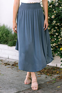 The slate round hem skirt is a versatile piece that effortlessly blends sophistication with a modern twist. Its unique rounded hemline adds a touch of flair, creating a fluid, dynamic silhouette. The soft slate hue is both timeless and chic, making it easy to pair with any top. Sitting high on the waist, this skirt flatters your figure while offering a comfortable fit. Perfect for work or weekend outings, it transitions seamlessly from day to night. #RoundHemSkirt #ModernElegance #SlateStyle #Ch Chic Skirt, Minimalist Capsule Wardrobe, Chic Skirts, Neutral Style, Hem Skirt, Neutral Fashion