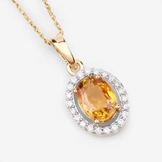 14K Gold Yellow Sapphire Pendant, Genuine Yellow Sapphire and Diamond Pendant Necklace, September Birthstone, Bridal Sapphire Pendant Bright, beautiful colors make this halo pendant into a one-of-a-kind statement piece you'll love. Our 1.78 ct. t.w. oval genuine yellow sapphire pendant necklace is set in polished fine finish 14k yellow gold for a divine look at a smart price. Yellow sapphire is a stunning gemstone that has a deep and rich yellow color. It is also very durable and resistant to sc Yellow Multi-stone Fine Jewelry, Gold Diamond Pendant Gemstone, Elegant Multi-stone Oval Pendant Jewelry, Oval Multi-stone Necklace In Fine Jewelry Style, Gold-tone Diamond Pendant, Dazzling Yellow Gold Jewelry With Stones, Exquisite Orange Gemstone Jewelry, Gold Necklaces With Oval Pendant And Stones, Elegant Multi-stone Oval Pendant Necklace