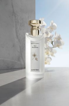 What it is: A woody and floral unisex fragrance reminiscent of a rare white Himalayan tea.Fragrance story: This delicate scent with its captivating and intimate nuance is made for those who seek deep relaxation in private, precious moments of luxury.Style: Woody, floral.Notes: White pepper, white tea accord, musks. Style Name:Bvlgari Eau Parfumée Au Thé Blanc Eau De Cologne Spray. Style Number: 120732. Available in stores. Tea Fragrance, Musk Perfume, Perfume Ad, Cosmetics Photography, Beauty Products Photography, Perfume Design