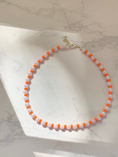 Fall glass orange bead pearl choker or necklace. Adjustable length. Perfect gift for birthday or for yourself! Fall necklace. Custom sizing and designs available! Fall Beaded Chokers, Fall Necklaces Diy, Orange Beaded Necklaces As Gift, Orange Beads As A Gift, Orange Necklaces With Tiny Beads For Gift, Orange Tiny Beads Necklace For Gift, Orange Choker With Colorful Beads, Adjustable Orange Choker With Round Beads, Orange Single Strand Beaded Necklace With Round Beads