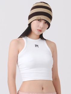 Editor's NotesOfficial sleeveless top set up. The sleeveless top is made of durable and soft material. It is a slimly fitted crop top that would go well with street mood styling. - Crop length- Slim fit- Lettering embroideryMeasurements(in.)One size (XS-M)Chest: 11.4 in.Total Length: 15.7 in. *Model info: Height 5' 51Composition & Care- 95% Cotton, 5% Elastane- Please check the care labelDesigner- by PIECEMAKER White Sleeveless Crop Top For Streetwear, Trendy Cotton Cropped Vest, Trendy Cotton Crop Top Vest, Trendy Sleeveless Crop Top For Streetwear, Trendy Fitted Vest For Streetwear, Trendy Streetwear Crop Top Vest, Fitted Vest Crop Top For Streetwear, Trendy White Vest For Streetwear, Casual Sleeveless Streetwear Crop Top