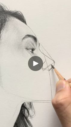 a drawing of a woman's face with a pencil in her mouth