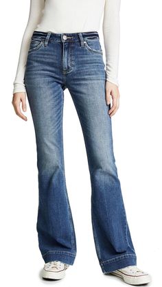 Wrangler Exaggerated Bootcut Jeans  $118 Bootcut Jeans Outfit, Chic Jean Outfits, Jeans Trend, Womens Jeans Bootcut, Teen Girl Dresses, What To Buy, Denim Trends, Jeans Outfit, Sporty Outfits