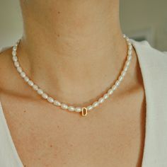 We love personalized jewelry and we know you do too, and this one is a must-have piece. This Pearl Initial Letter Necklace is made by hand with freshwater pearls and 14k gold-filled claps. This personalized design will make feel special to whoever wears it, if you are looking for a gift this one is perfect! Wanna add more letters? click link below https://www.etsy.com/listing/1083060815/extra-letter-and-extra-symbol-for *Personalized pieces take between 2-4 business days to ship* DETAILS: Water Resistant  Material: 14k gold-filled  Freshwater Pearls ALL LETTERS ARE CAPITAL  + 2-inch adjustable extender chain  Notice these are natural pearls therefore shape and size may vary, each necklace is unique and different ♡ Match perfectly with other jewels in our shop See more similar items in the Gift Pearl Necklace With Letter Beads, Letter Beads Pearl Necklace Gift, Initial Letter Necklace, Sweet Necklace, Monogram Necklace, Initial Letter, Necklace Personalized, Letter Necklace, Feel Special