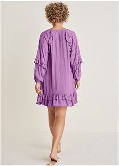 This lively mini dress has something up its sleeves: ruffles! With frilly, feminine details along the arms and at the hem, this dress ruffles up some flair in your wardrobe. Its long sleeves and tie neckline create a modest look that transitions effortlessly from season to season. Flowy Long Sleeve Dress With Ruffles, Casual Long Sleeve Ruffled Dress For Spring, Knee-length Long Sleeve Ruffled Dress For Spring, Flowy Mini Dress With Bell Sleeves And Ruffle Hem, Spring Flowy Long Sleeve Dress With Ruffles, Flowy Long Sleeve Dresses With Ruffled Skirt, Flowy Long Sleeve Ruffle Dress With Ruffle Hem, Bell Sleeve Mini Dress With Ruffle Hem For Brunch, Summer Long Sleeve Tiered Dress With Ruffle Hem