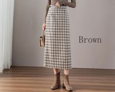 * A high-end wool wrap skirt, with plaid pattern. * Made of wool blends, fully lined. * Can custom make waist size and skirt length. * Material: Outer-50% wool, 50% polyester; lining-100% polyester * Washing instructions: Dry Clean Only * Size: True to US size, US 0-US 20 are available, you can let us know your usual size and height in your order. * Shipping: Free shipping Processing time : 5-7 Business days Delivery time : 7-20 Business days Tracking number available If you need rush order or e Wool Wrap Skirt, Dark Grey Skirt, Wool Midi Skirt, Skirt Winter, Skirt Wool, Embroidery Skirt, Skirt Wrap, Skirt High Waist, Elastic Waist Skirt