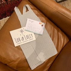 a brown leather chair with a tag on it