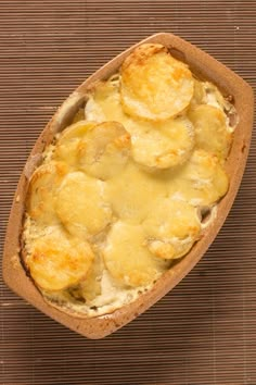 an overhead view of a baked dish with potatoes