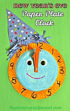 a paper plate clock with a happy face on it and the words new year's eve