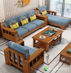 a living room with blue couches and wooden tables