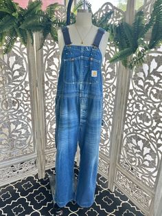 Perfect fade on these Carharrt denim overalls, soft with authentic wear, they still have many years of service left in them. Shipping to you freshly washed and ready to wear, we never ship unwashed vintage Shown on a size 8 womens form, these are a mens overalls originally  check the measurements below to know how they will fit you  waist 44'' hips 48'' rise 14'' inseam 30'' a vintage or recycled item, no returns or refunds so message with us before you buy if you have any questions go to our Et Carhartt Overall, Carhartt Overalls, Overalls Vintage, Carhartt Vintage, Vintage Overalls, Mens Overalls, Vintage Workwear, Vintage Carhartt, Faded Denim