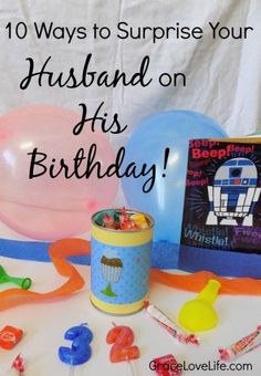 a birthday party with balloons, candies and books on the table for 10 ways to surprise your husband on his birthday