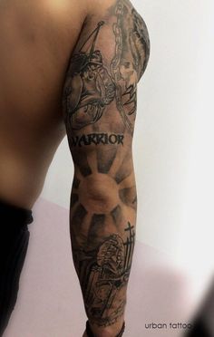 a man's arm with tattoos on it and the word warrior written in black ink