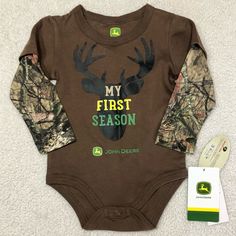 John Deere Long Sleeved Camo Onesie Brown Shirt With Camo Sleeves Snap Closure “My First Season” Logo Size: 6-9 Months Color: Brown Condition: New With Tags Brown Shirt, Month Colors, Baby Outfits Newborn, Baby Outfits, John Deere, Onesies, Baby Onesies, Camo