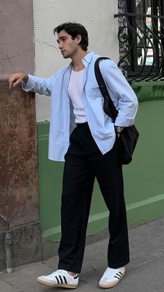 An effortlessly cool look featuring a light blue shirt, white tank top, black pants, and white sneakers. Ideal for casual city strolls and laid-back weekends.  #MensFashion #CasualStyle #StreetWear #OOTD #FashionInspo #UrbanOutfit #TrendyLook #MensWear #CasualChic #EffortlessStyle Classy Aesthetic Men Outfit, Men Street Wear Aesthetic, Aesthetic Old Money Outfits For Men, Old Money Men Fits, Light Outfits Men, Street Business Casual Outfits, Summer Boys Aesthetic, Black Outfit Men Casual Classy, Men Outfit Inspiration Casual