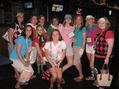 a group of young women standing next to each other in front of a tv screen