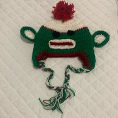 Toddler Sock Money Hat Crochet Hat Christmas Photo Prop Hat Red Green White New No Tags Handmade Never Had Tags Non Smoking Home New Sock Monkey Hat Photo Prop Money Hat, Sock Monkey Hat, Monkey Hat, Christmas Photo Props, Hat Photo, Toddler Socks, Sock Monkey, Hat Crochet, Christmas Photo